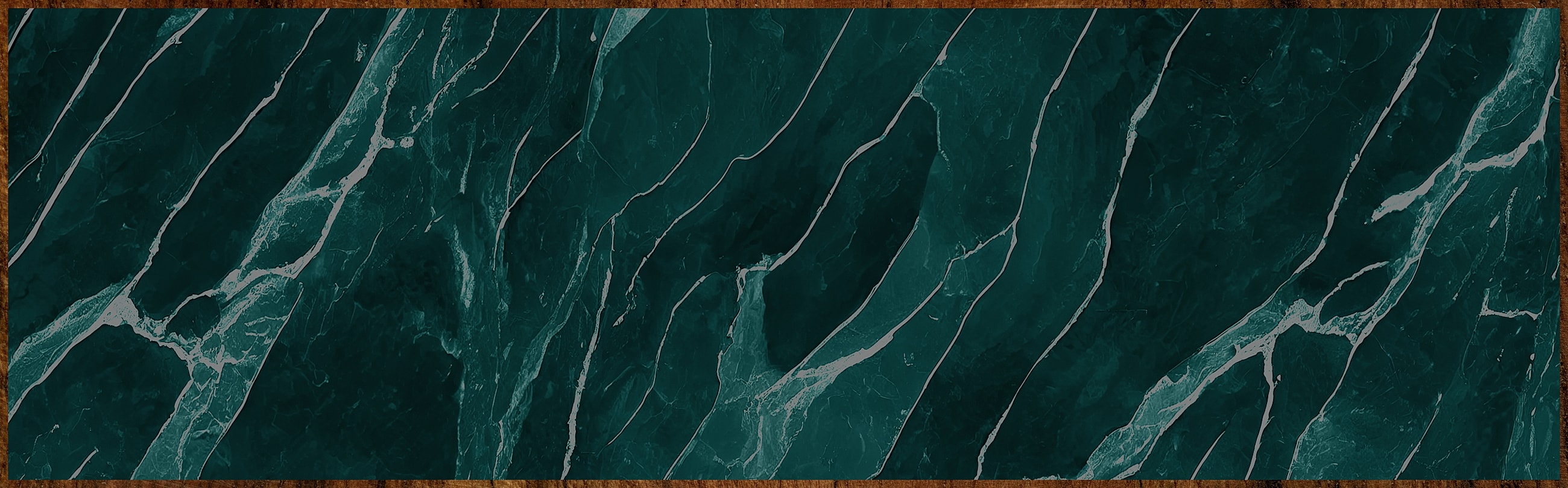 Dark green marble texture with white veining.