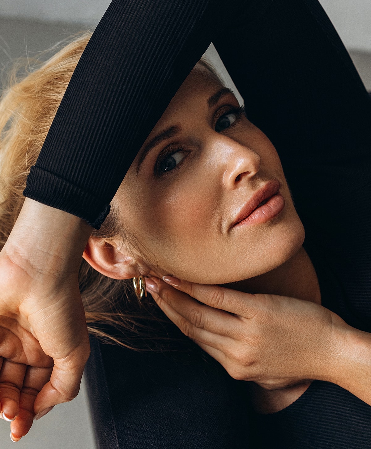 Close-up of a woman with soft makeup.