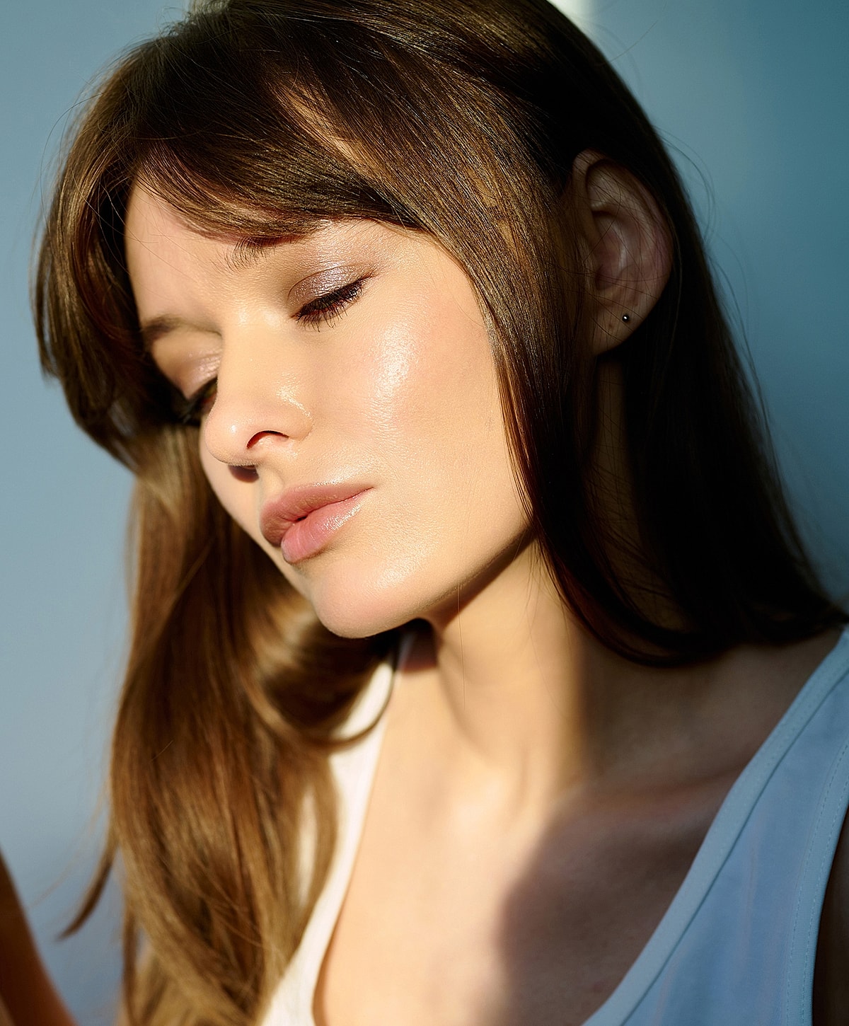 Model wearing a lace bra, showcasing elegant design.
