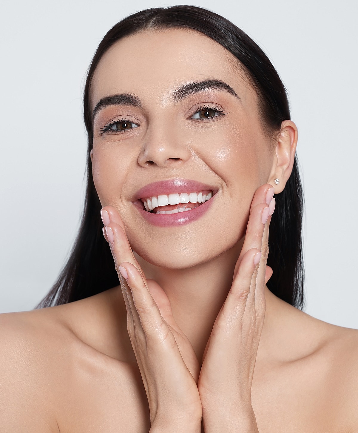 Facial treatment in a skincare clinic setting.